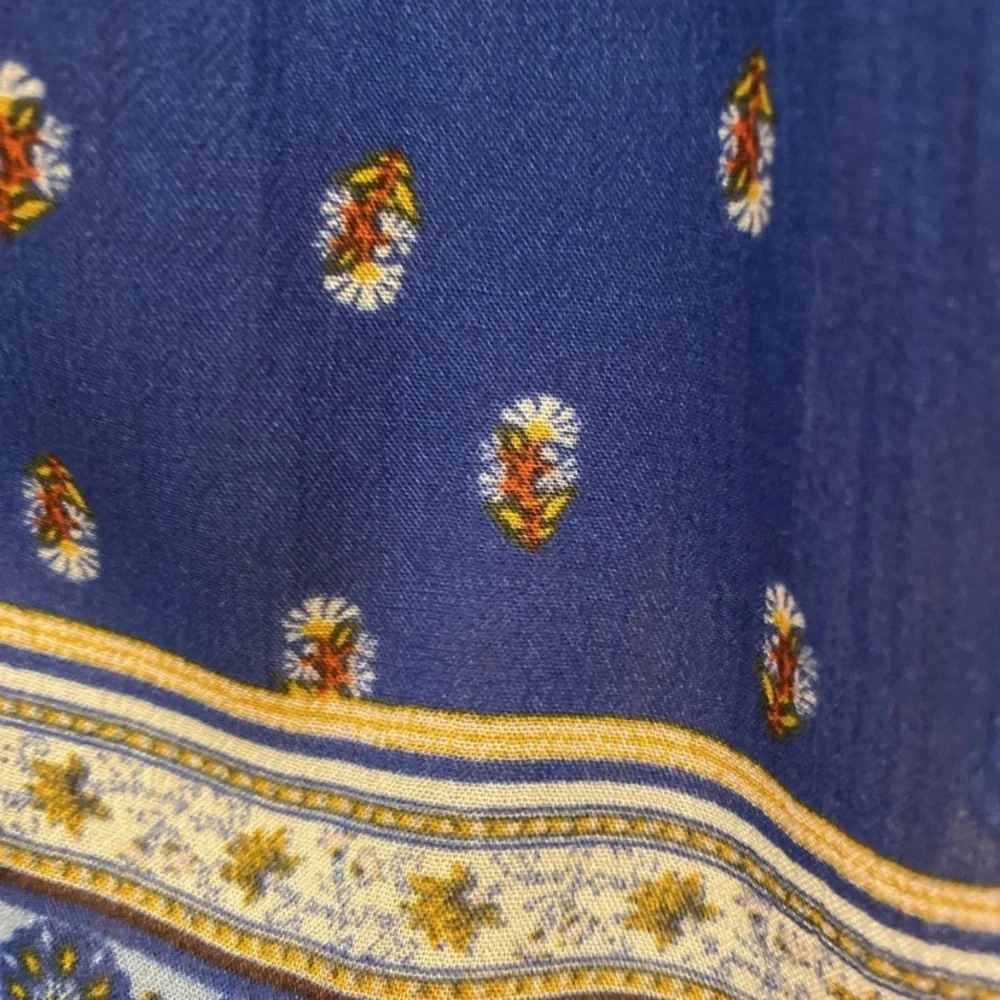 Rewind Royal Blue Sleeveless Floral Blouse with Patterned Hem